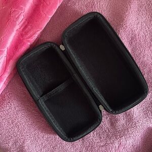 Hermit shell speaker with case and charger .